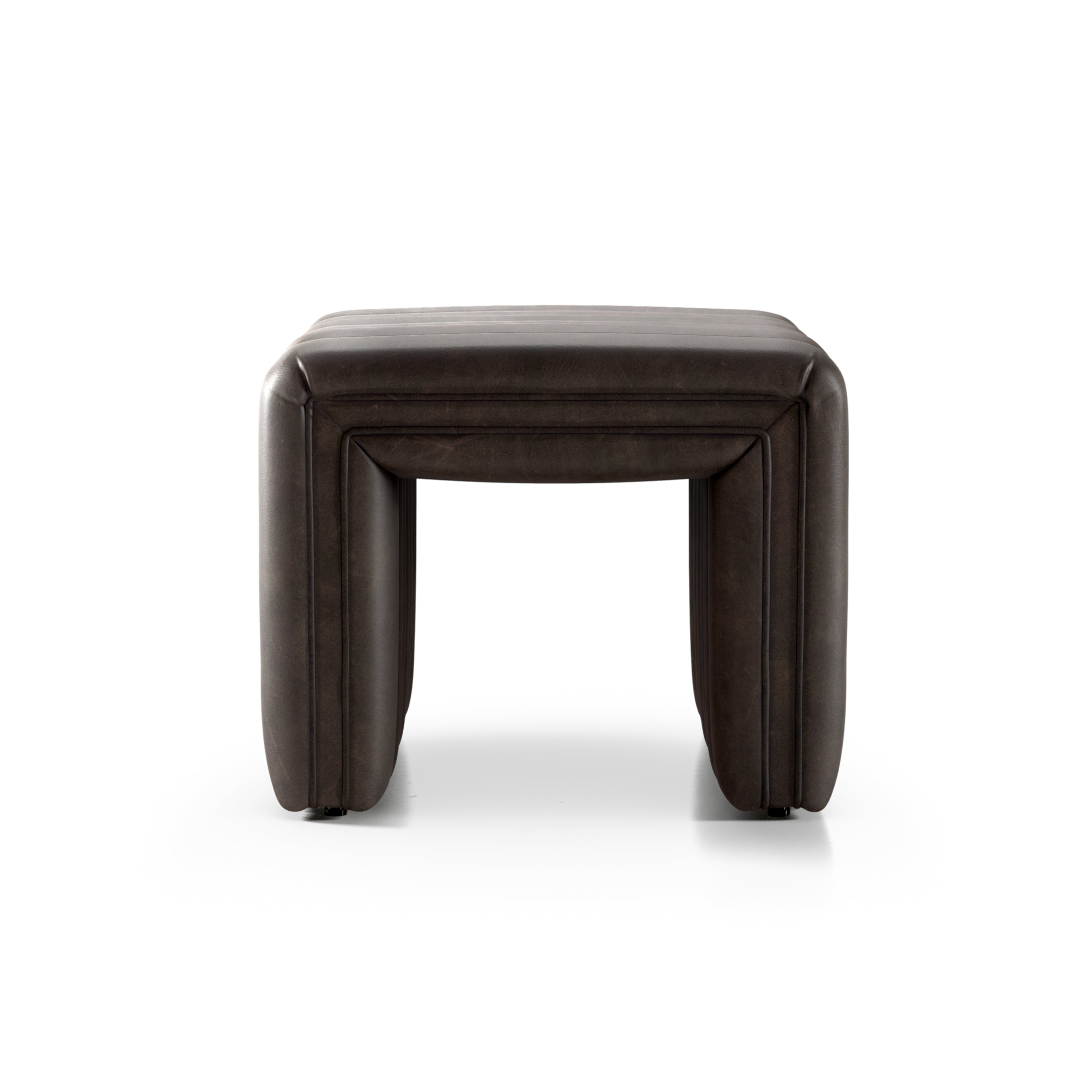 Dark brown leather ottoman with vertical stitching and a square shape