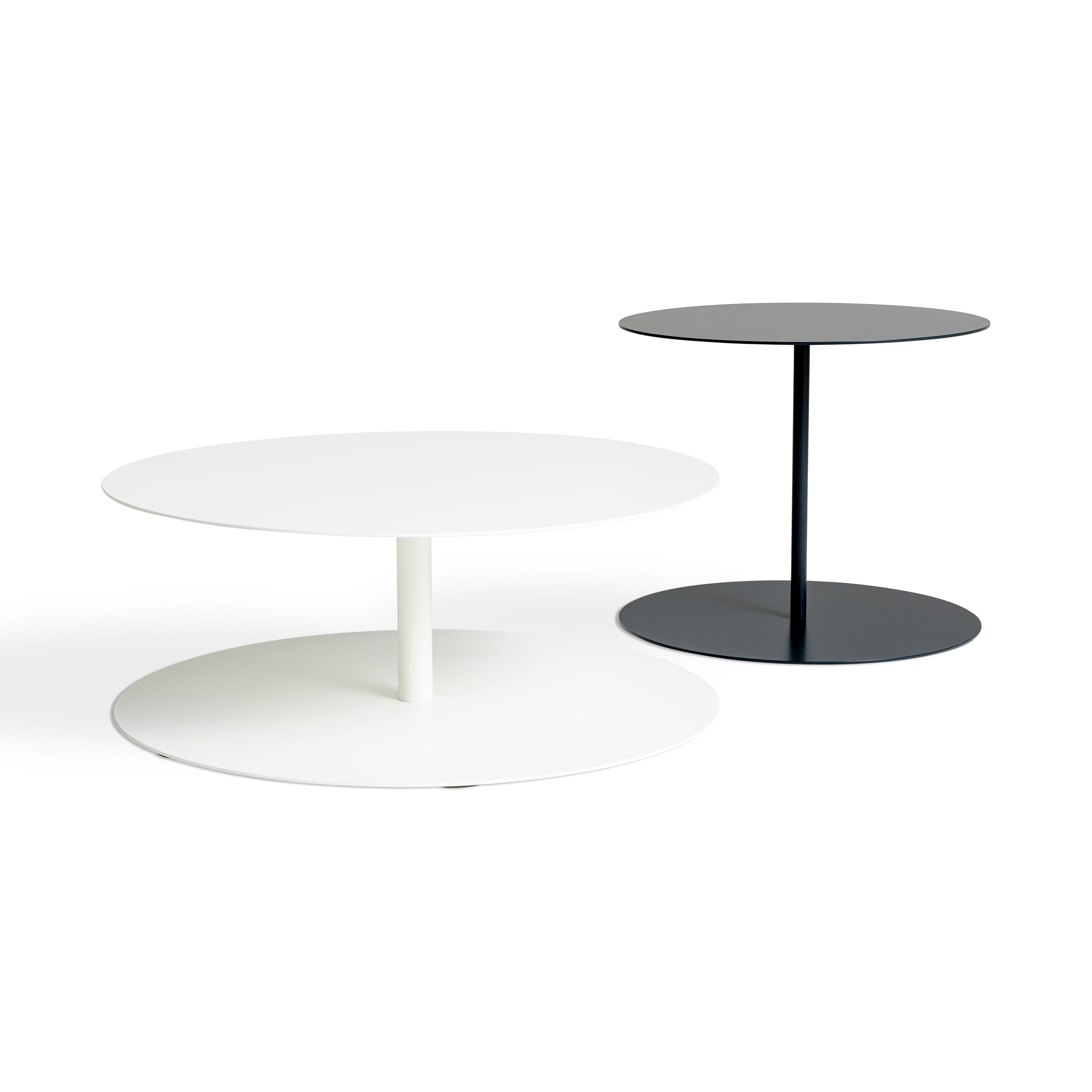 White and black circular coffee tables with a modern design