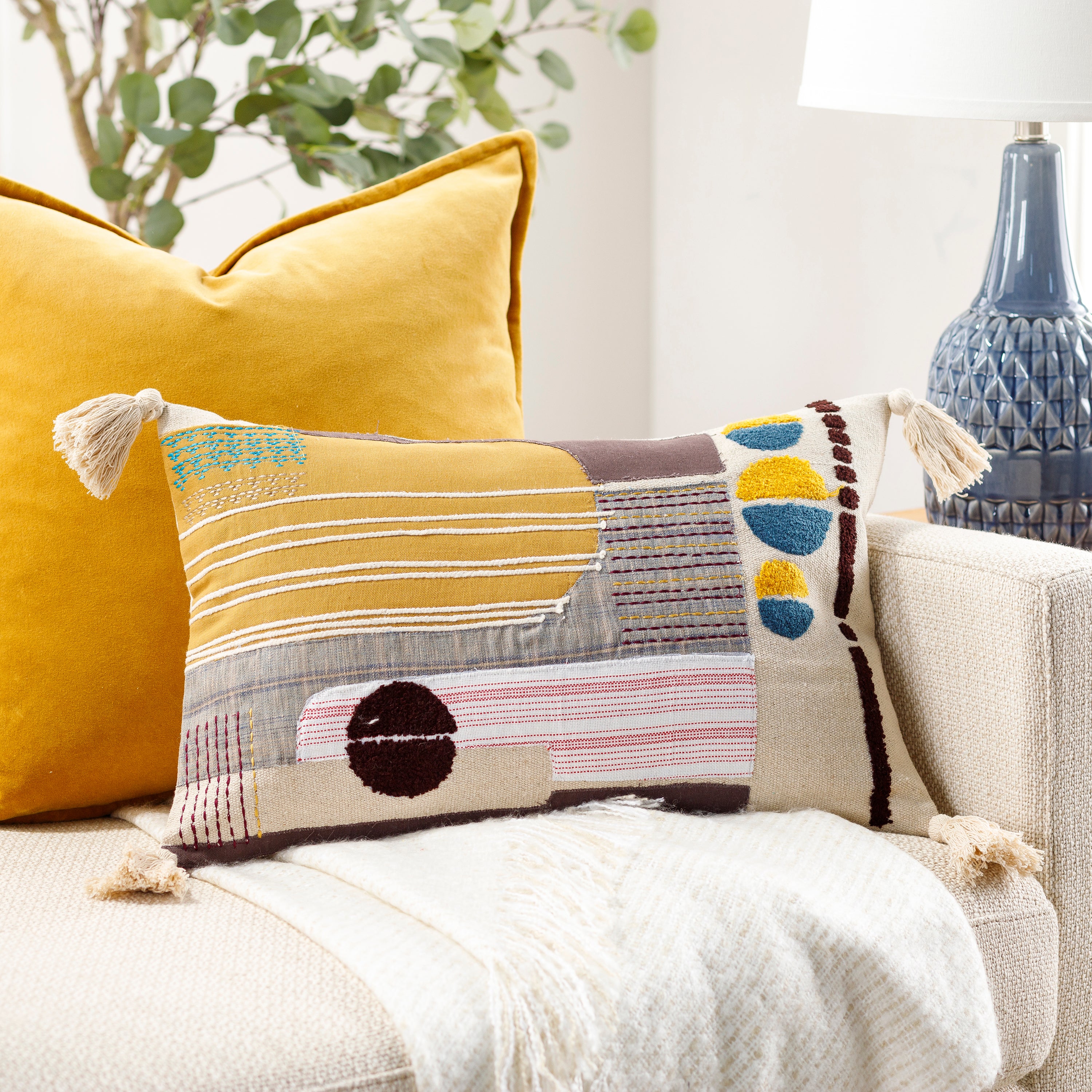 Artisan throw on sale pillows