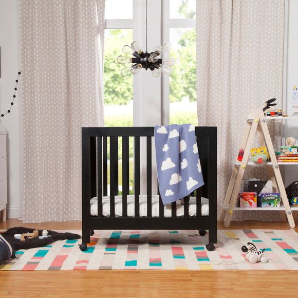 Babyletto origami cheap mini crib used