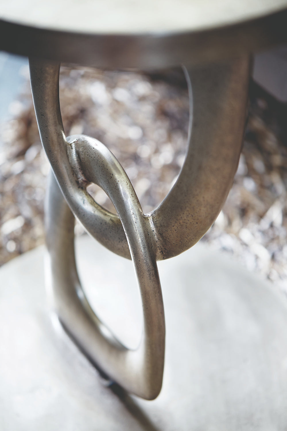 Linea Metal Round Chairside Table with Interlocking Shape