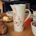 Cloudy Butterflies Pitcher