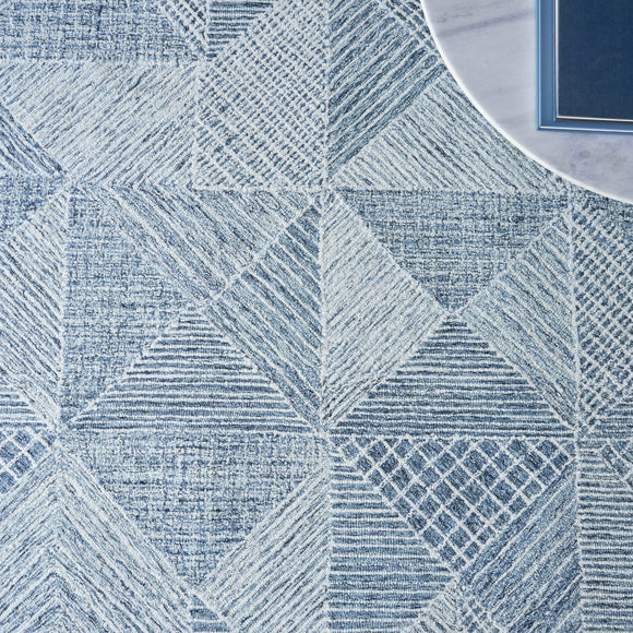Caprice Geometric Area Rug