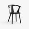 In Between Upholstered Dining Armchair  option Black Noble Leather / Black Lacquered Oak