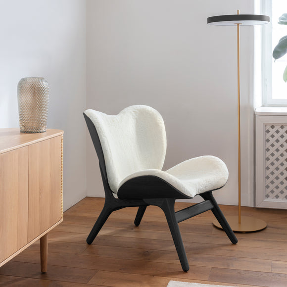 A Conversation Piece Lounge Chair