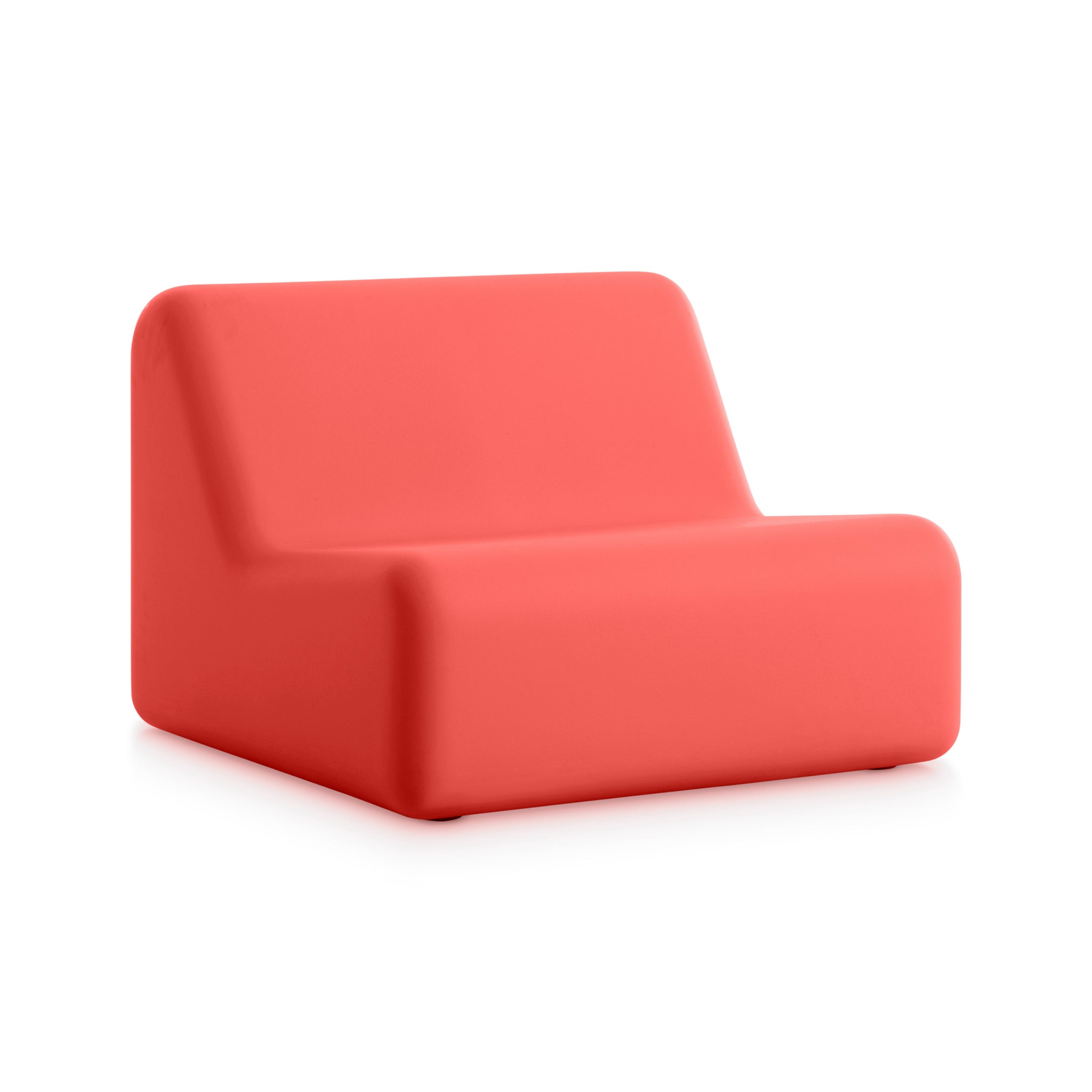 Solid red, modern armchair shown from a slight angle.
