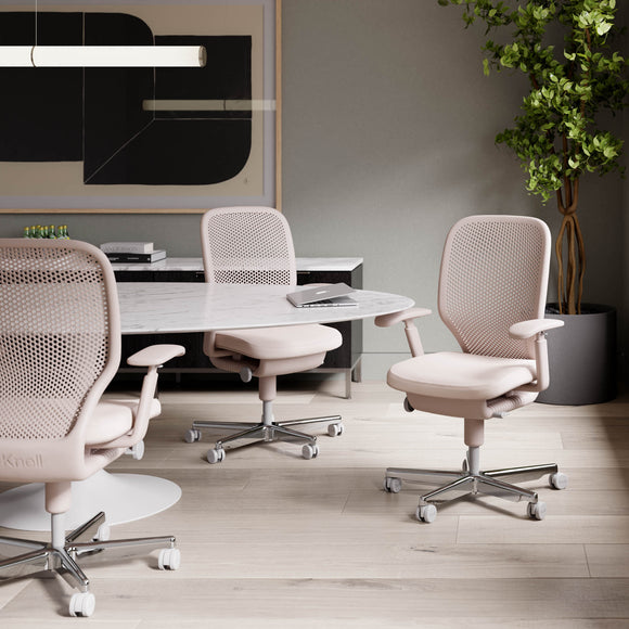 Marc Newson's Task chair brings a “floating” seat, perforated back
