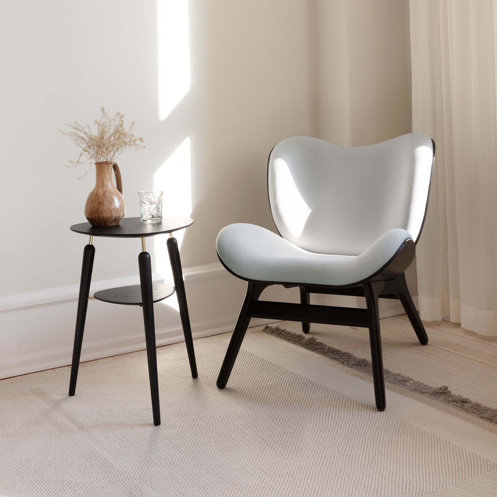A Conversation Piece Lounge Chair