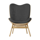 A Conversation Piece Tall Lounge Chair
