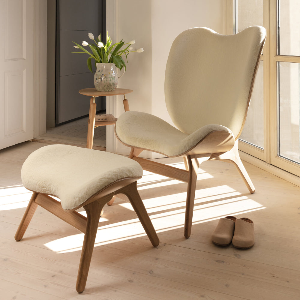 A Conversation Piece Tall Lounge Chair