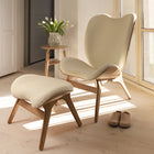 A Conversation Piece Tall Lounge Chair